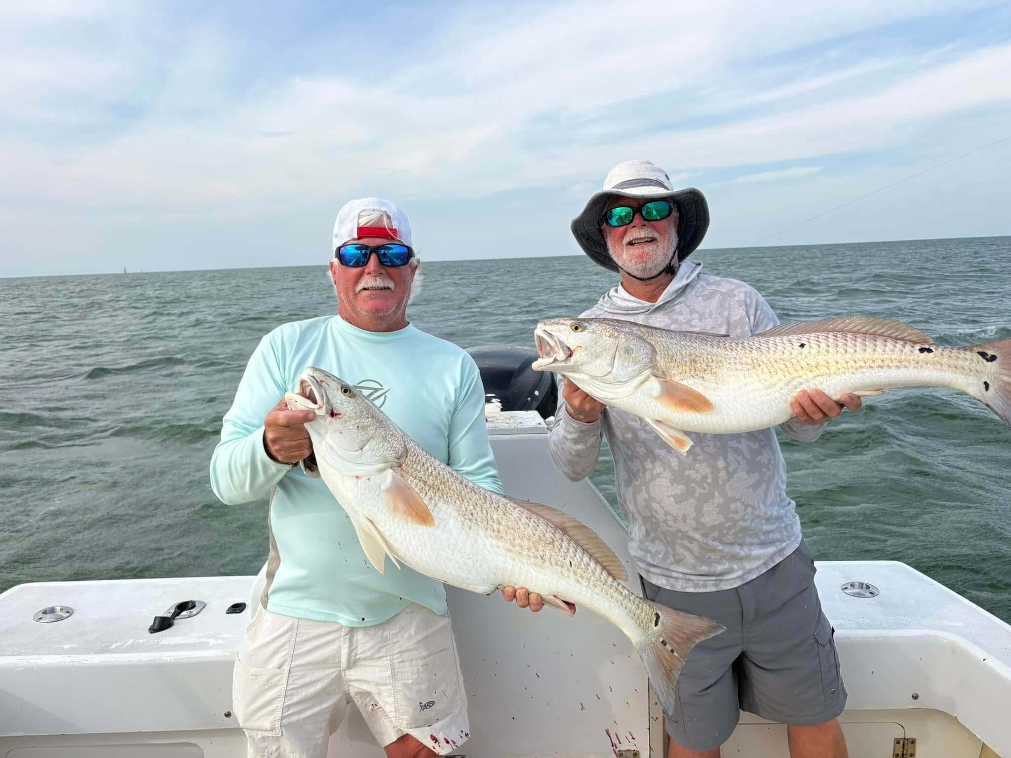 Drumrunner anglers with nice Ocracoke red drum.