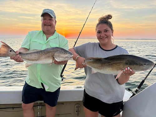Drumrunner anglers with nice Ocracoke red drum.
