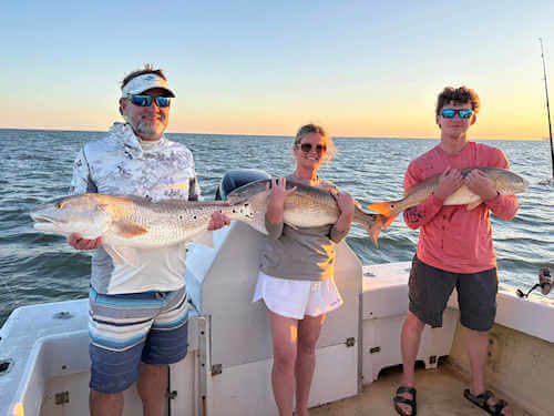Drumrunner anglers with nice Ocracoke red drum.