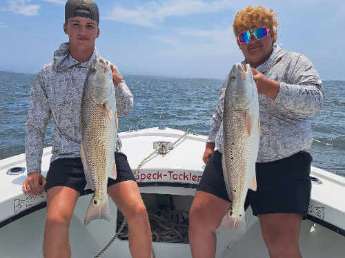 Speck-Tackler group has awesome catch on big red drum.